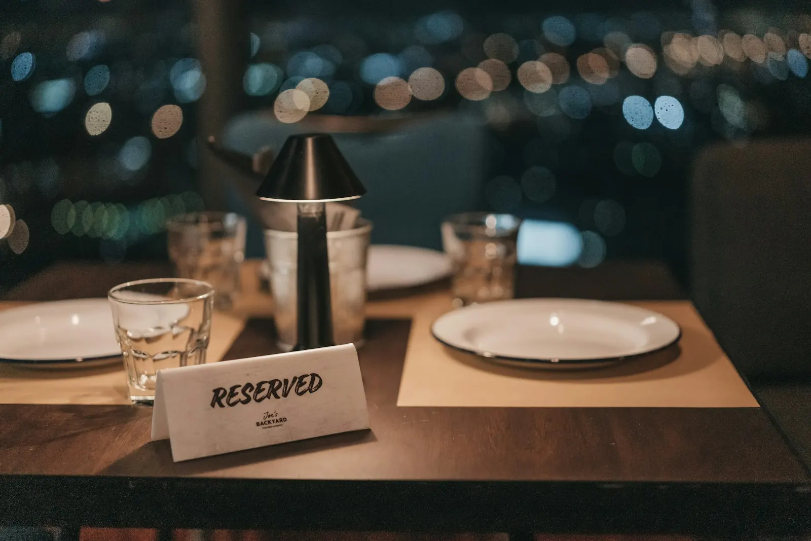 Reserved restaurant table set for evening service