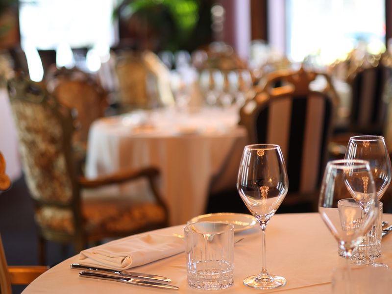 Fine dining table set with glassware and cutlery