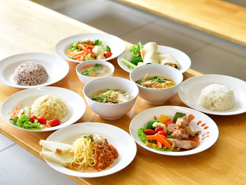 Colourful restaurant dishes arranged on a table